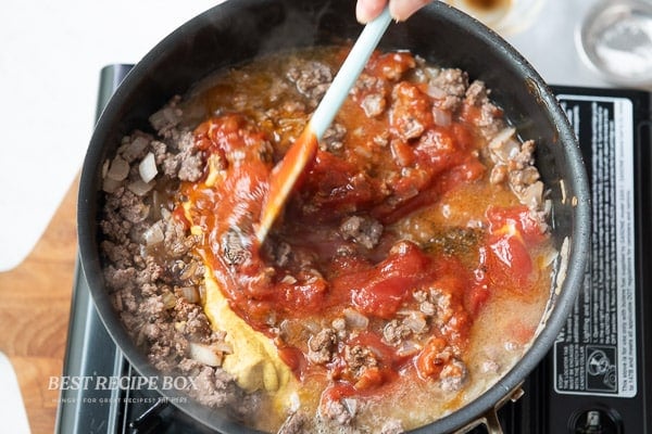 stirring in sauces and spices