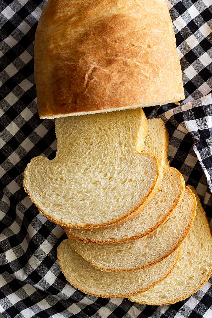A top down view of slices of bread and the loaf. 