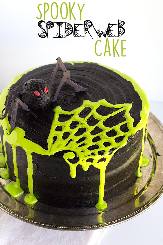 Spooky Spiderweb Cake - the perfect chocolate Halloween cake with black chocolate frosting and toxic green fluff sludge. It should be at all the parties!