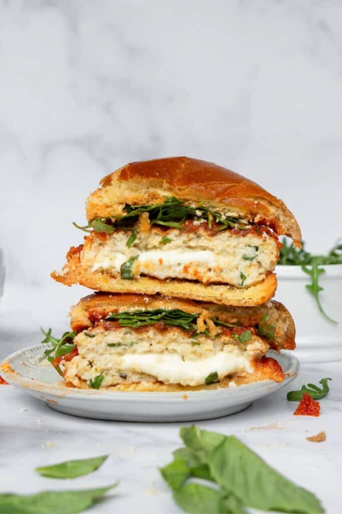 chicken Parmesan burgers with gooey mozzarella cheese stuffed in the middle