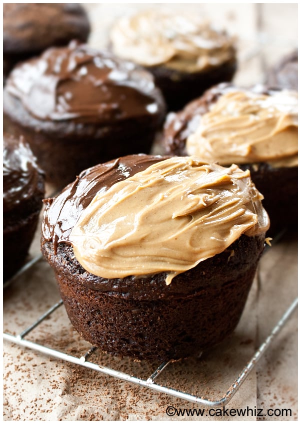 Easy Sugar Free Chocolate Cupcakes on Cooling Rack Topped Off With Chocolate Hazelnut Spread and Peanut Butter.