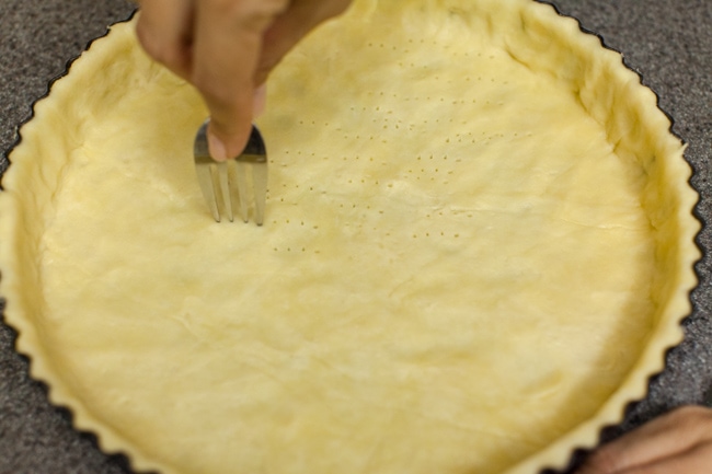 Using fork to poke holes in Sugar Pie crust dough