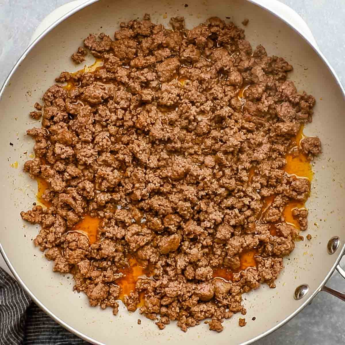 cooked ground beef in a skillet