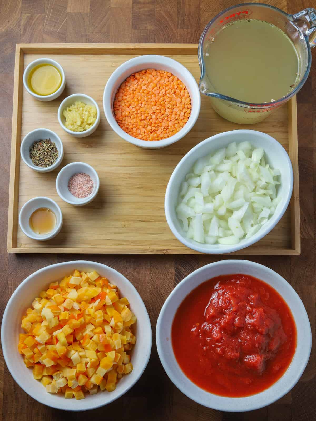 Photo of the ingredients to make tomato, lentil and squash soup.