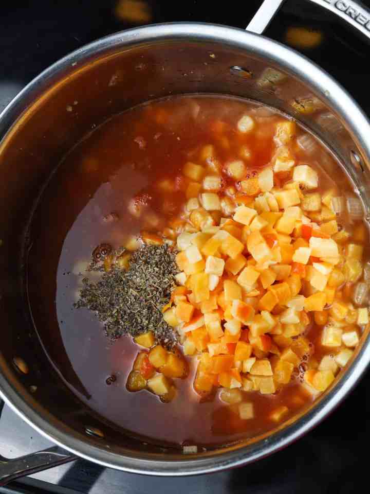 Photo of all ingredients added to the onion and garlic.