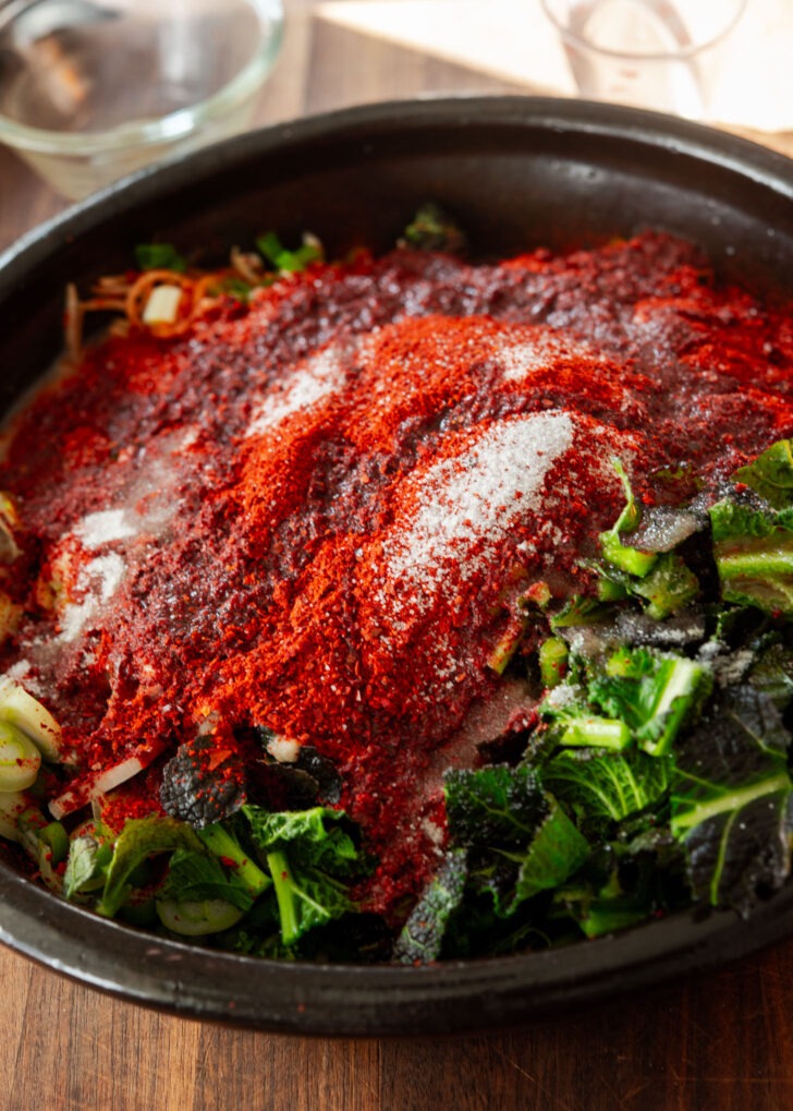 Combining all the kimchi seasoning paste ingredients in a bowl.