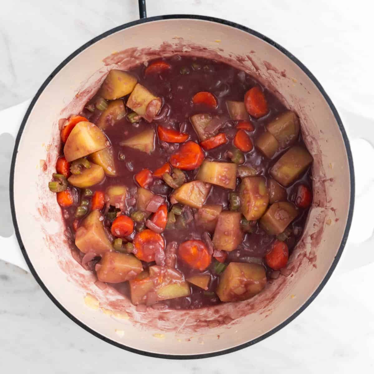 Vegetables sautéed in olive oil with flour and red wine added.
