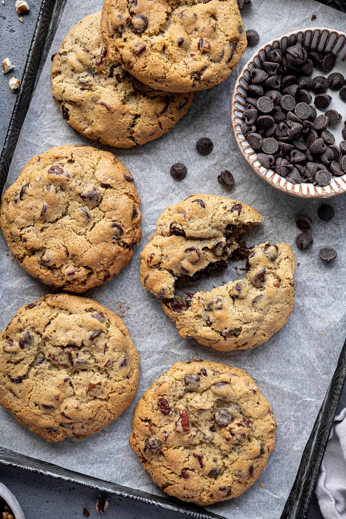 A tray of cookies, one broken in half.