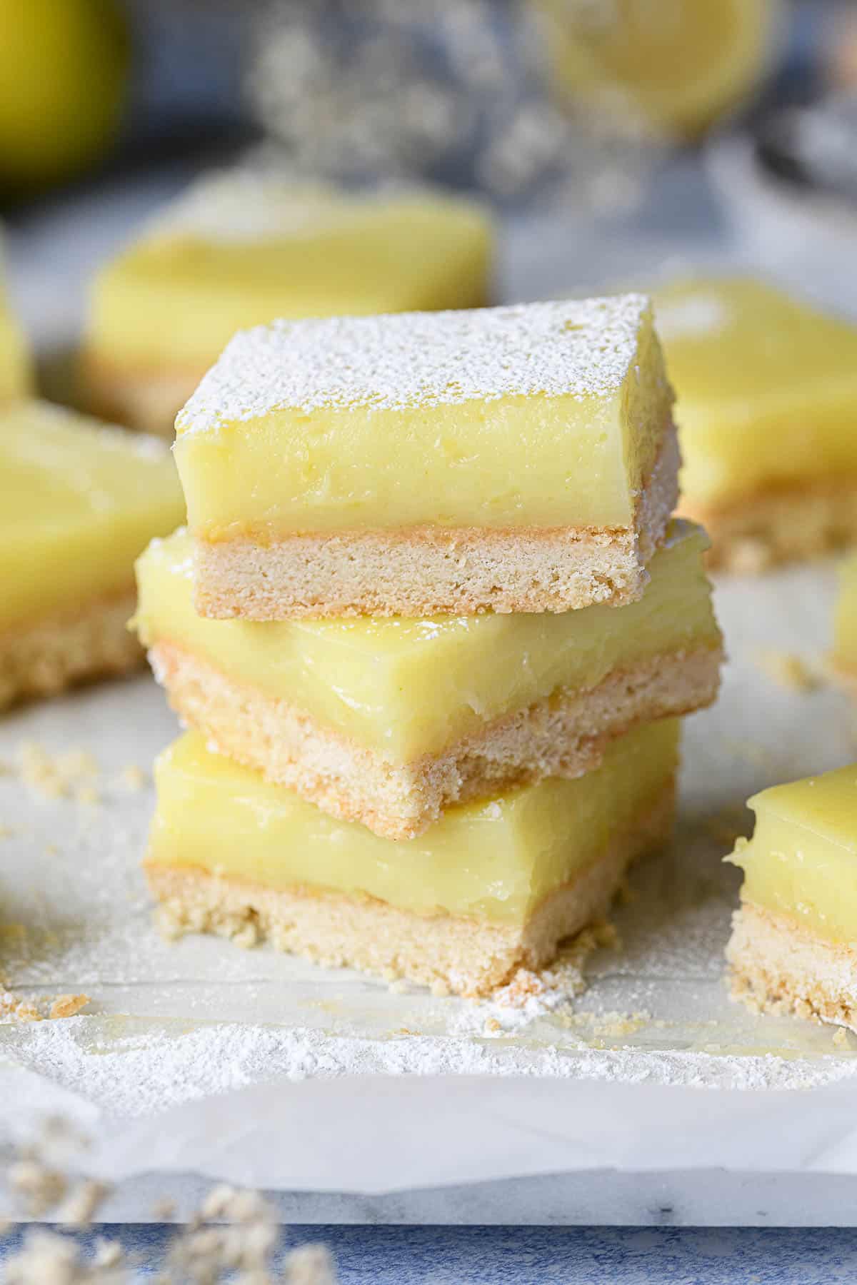 A stack of vegan lemon bars.