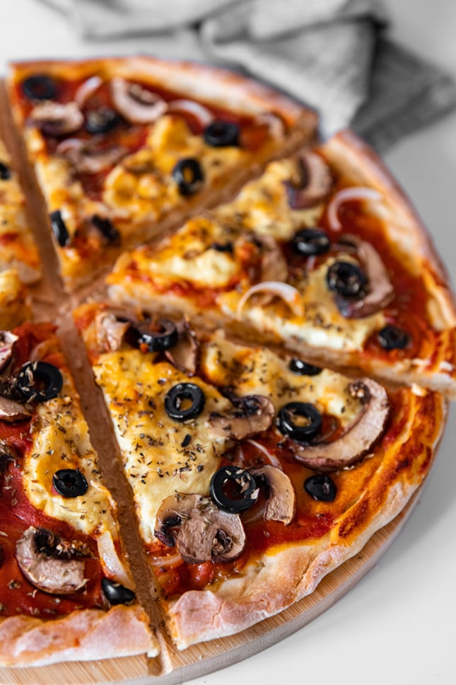 Photo of some slices of vegan pizza