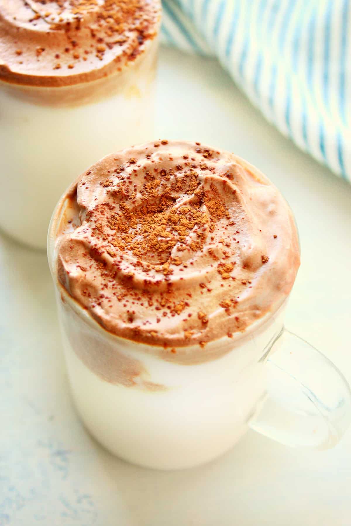 Whipped Hot Chocolate Recipe Whipped hot chocolate in a glass.